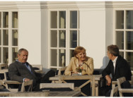 Angela Merkel im Gespräch mit George W. Bush und Tony Blair