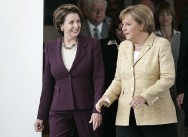 Nancy Pelosi and Angela Merkel walking to the press conference